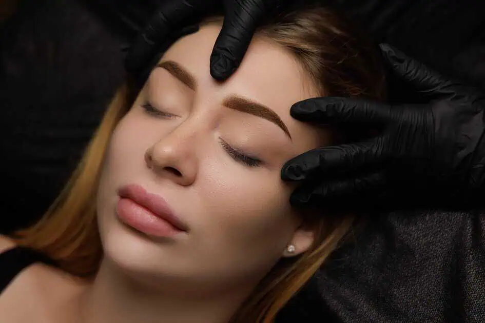 a woman getting a facial massage
